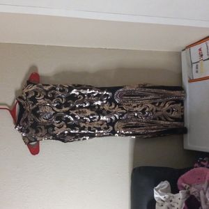 Black and gold sequins dress